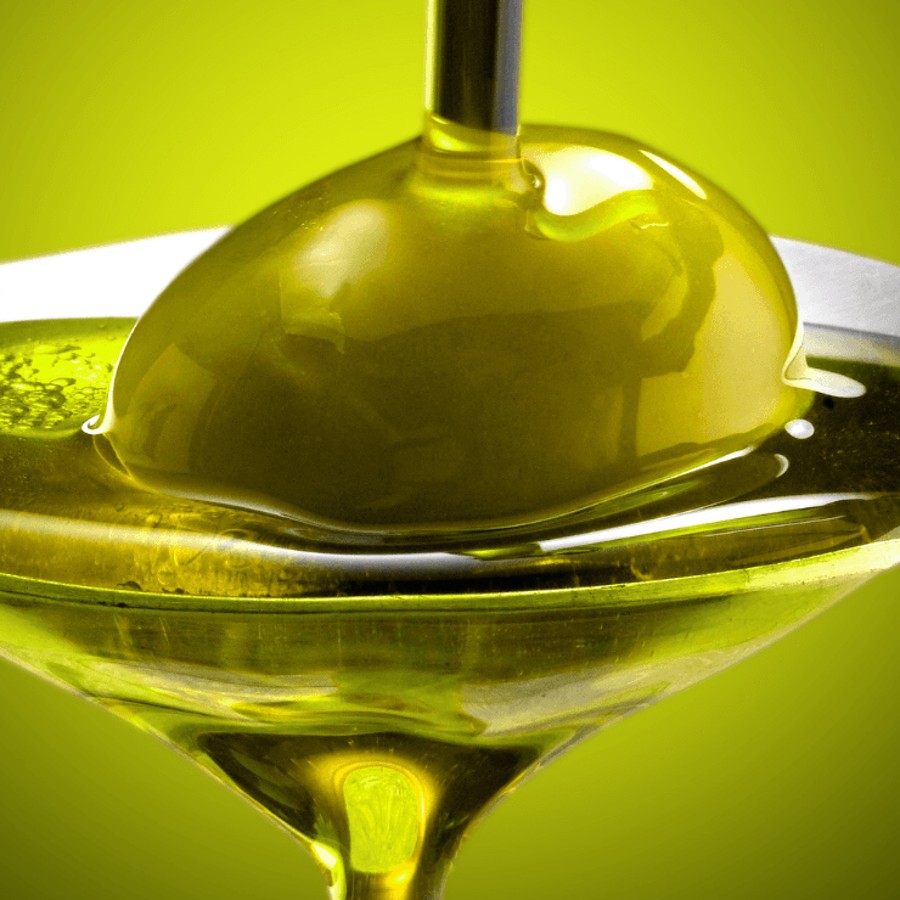 A spoon of fresh Tuscan olio nuovo, green gold