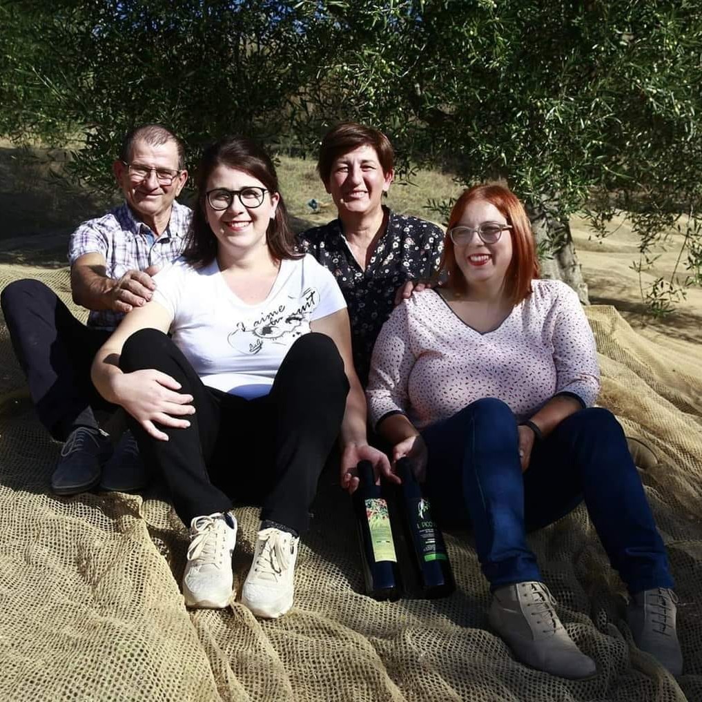 The L'Oliveta family among their olive trees